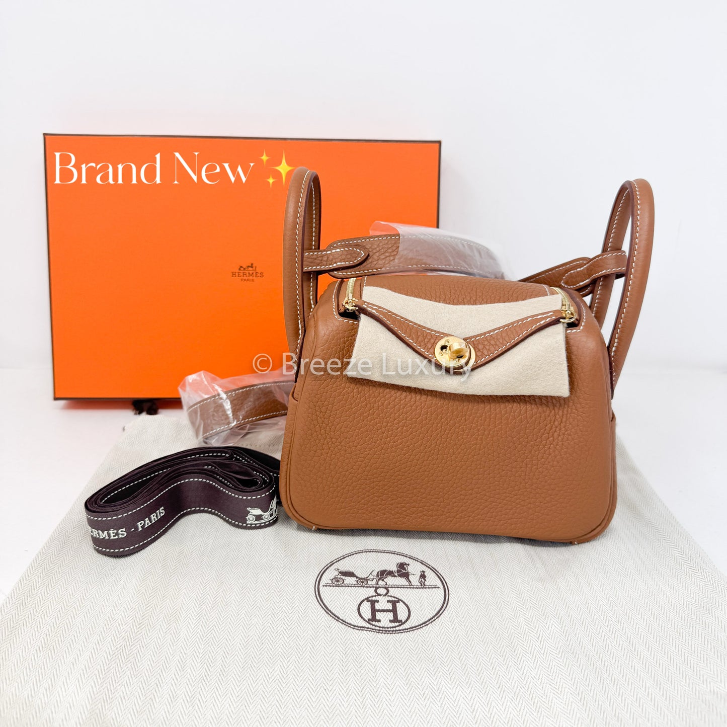 Hermes Taurillon Mini Lindy Gold